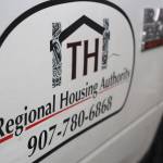 A Tlingit Haida Regional Housing Authority truck sits parked in the Mendenhall Valley. On Monday night the Juneau Assembly OKd an ordinance to transfer about 11.5 acres of city-owned land on Pederson Hill to the authority for less than fair market value. (Clarise Larson / Juneau Empire)