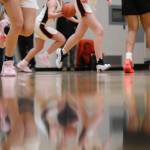 Basketball players face off at Juneau-Douglas High School: Yadaa.at for a basketball game in December 2022. (Clarise Larson / Juneau Empire File)