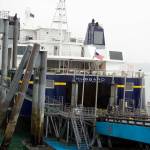 The Hubbard ferry docks at the Alaska Marine Highway System terminal in Juneau on June 26 for a christening ceremony. The 280-foot-long vessel, with room for 300 passengers and 53 standard-length vehicles, officially was put into service in Southeast Alaska in May. But officials said Friday it may be taken out of service next week due to an employee shortage. (Mark Sabbatini / Juneau Empire)