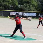 Riley Morehouse pitches for Juneau during the third inning of a game against Anchorages Abbot-O-Rabbit during the Majors Softball State Tournament on Saturday at Melvin Park. The Anchorage team attempted to come back from a 7-2 deficit by loading the bases and scoring two runs during the inning before Morehouse ended the rally. (Mark Sabbatini / Juneau Empire)