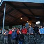 Dozens of residents gathered Wednesday night at a pavilion at the Mendenhall Glacier Visitor Center to honor Paul Rodriguez Jr. who drowned while kayaking on Mendenhall Lake last week. (Clarise Larson / Juneau Empire)