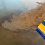 This photo provided by North Slope Borough shows an aerial view of a shallow lake where a helicopter crashed on Alaskas North Slope near Utqiagvik on Thursday. A North Slope Borough search and rescue team in a helicopter found debris matching the description of the missing helicopter, but officials said no bodies of the pilot or three passengers had been seen or recovered. (North Slope Borough via AP)