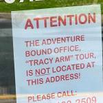 A sign at a Juneau business alerts people searching for Adventure Bound Alaska that the tour company is no longer at an address listed at the companys website. (Meredith Jordan / Juneau Empire)