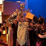 A large puppet takes center state during a rehearsal of Theatre in the Roughs She Kills Monsters, which opens Friday, at McPhetres Hall on Monday night. (Meredith Jordan / Juneau Empire) (Meredith Jordan / Juneau Empire)