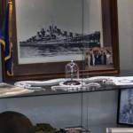 This undated photograph shows the USS Juneau memorial items that were on display at the American Legion Auke Bay Post #25 when it was burglarized in January of 2020. The long strand of beads represented those immediately killed during the torpedoing and sinking of the ship, another strand represented those who were alive and in the water, and the short strand represented those who were rescued from the water days later. The final few beads in the glass dome represented those who were still living at the time of the 75th anniversary presentation. (Courtesy photo / American Legion Auke Bay Post #25)