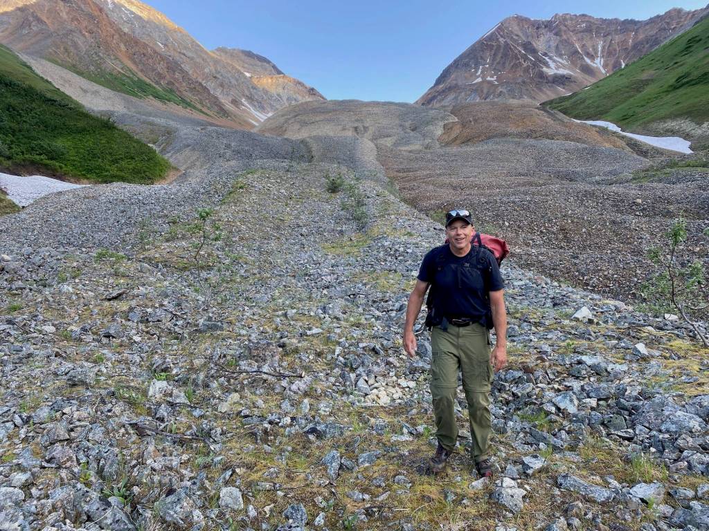Ned Rozell walks on Fireweed rock glacier near McCarthy this month. (Photo by Adam Bucki)