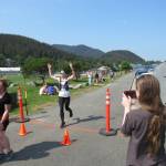 Kristin Campbell, of Deer Park, Ohio, is photographed by observers at the finish line of the Juneau Half Marathon on Saturday at Savikko Park. (Photo courtesy of Juneau Trail and Road Runners)