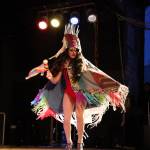 Lituya Hart Monroe shows off her fit with a spin during a performance at the main stage of the Southeast Alaska State Fair in Haines on Friday evening for the performance groups debut show at the fair. (Clarise Larson / Juneau Empire)