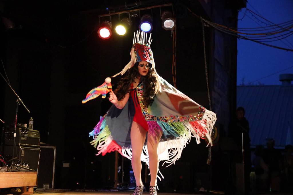 Lituya Hart Monroe shows off her fit with a spin during a performance at the main stage of the Southeast Alaska State Fair in Haines on Friday evening for the performance groups debut show at the fair. (Clarise Larson / Juneau Empire)