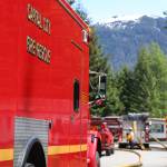 This is a photo of a Capital City Fire/Rescue vehicle at the scene of a fire in June. (Clarise Larson / Juneau Empire File)