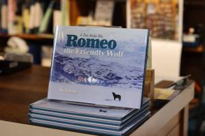 Copies of Nick Jans new book, Romeo the Friendly Wolf, arrived at Hearthside Books about two weeks ago. (Meredith Jordan / Juneau Empire)
