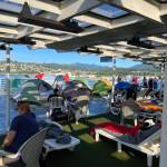 Tents fill a passenger deck of the Columbia as it departs Bellingham, Washington, on July 14. Such campouts are part of the most notorious aspects of the nearly 50-year-old Alaska Marine Highway System vessel. (Meredith Jordan / Juneau Empire)