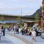 People visit information tables at the annual Climate Fair for a Cooler Planet on Saturday afternoon at Overstreet Park. (Meredith Jordan / Juneau Empire)
