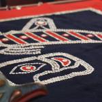 This photo taken in Juneau on Monday is of the Dei Kéet Deitlein Xoow (Killer Whale Stranded While Hunting, Robe) from the Naanya.aayí clan in Wrangell. The item was repatriated from the Portland Art Museum. (Clarise Larson / Juneau Empire)