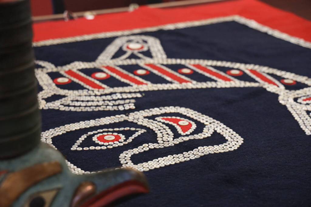 This photo taken in Juneau on Monday is of the Dei Kéet Deitlein Xoow (Killer Whale Stranded While Hunting, Robe) from the Naanya.aayí clan in Wrangell. The item was repatriated from the Portland Art Museum. (Clarise Larson / Juneau Empire)