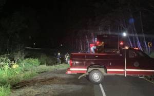 This is a photo of a vehicle crash site early Wednesday morning near 34 Mile on Glacier Highway. A teenager has been arrested with driving under the influence and third-degree assault resulting from injuries suffered by the passenger. (Courtesy/ Capital City Fire/Rescue)