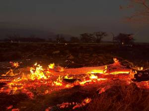 A wildfire burns in Kihei, Hawaii late Wednesday. Thousands of residents raced to escape homes on Maui as blazes swept across the island, destroying parts of a centuries-old town in one of the deadliest U.S. wildfires in recent years. (AP Photo/Ty ONeil)