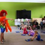 Drag queen Gigi Monroe performs an opening song during a Drag Storytime at the Mendenhall Valley Public Library on Saturday, Aug. 5. (Mark Sabbatini / Juneau Empire)