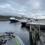 Three Alaska Marine Highway System ferries are docked at its headquarters in Ketchikan as the Columbia arrives on July 16. (Meredith Jordan / Juneau Empire)