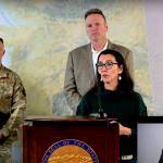 U.S. Rep. Mary Peltola, D-Alaska, answers a question while Gov. Mike Dunleavy, a Republican, listens behind her during a press conference Sept. 23, 2022, in the wake of Typhoon Merbok that caused widespread destruction in western Alaska. The press conference was the first time Dunleavy spokesperson Shannon Mason met Peltola professionally, with Mason now working as the congresswomans spokesperson as of Sept. 1. (Screenshot from official video from the Alaska Office of Governor)