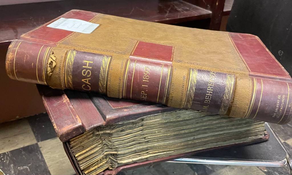 Bound bank ledger volumes including September 1897. (Photo courtesy Anne Gruening)