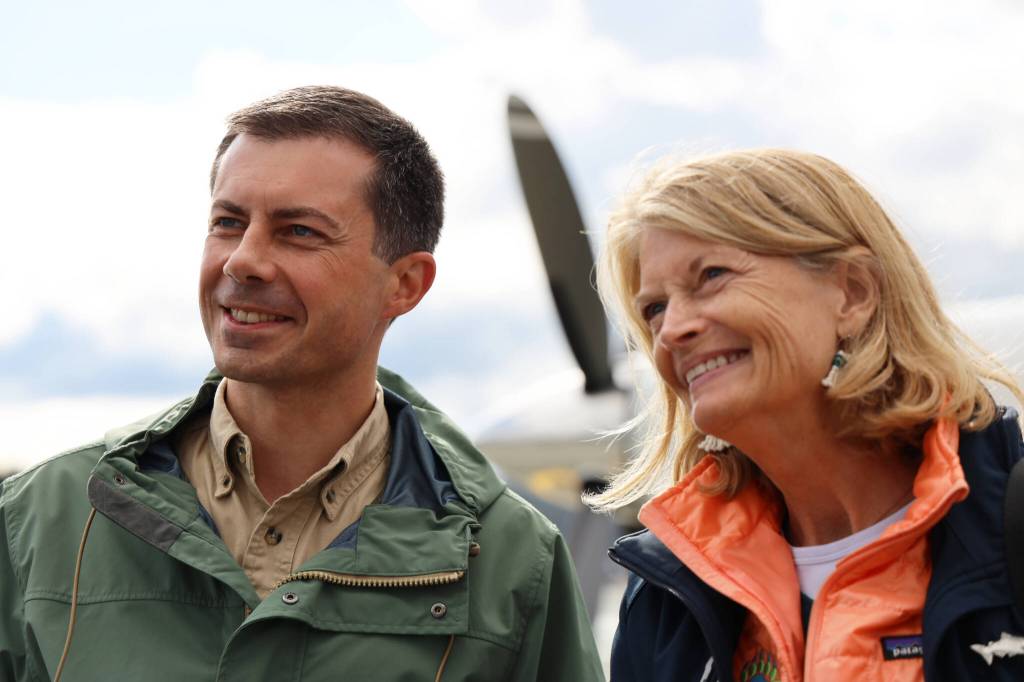 U.S. Transportation Secretary Pete Buttigieg and U.S. Sen. Lisa Murkowski, R-Alaska, smile for a photo Wednesday afternoon at Juneau International Airport. The capital city was the final stop on Buttigiegs three-day visit to Alaska. (Clarise Larson / Juneau Empire)