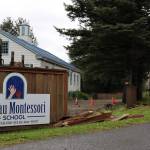 A portion of fence at Juneau Montessori School is missing following a hit-and-run crash early Thursday morning. (Clarise Larson / Juneau Empire)