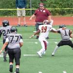 Juneau sophomore quarterback Noah Ault is sacked during the second half of Saturdays game against the Dimond High School Lynx at Adair-Kennedy Field. (Mark Sabbatini / Juneau Empire)