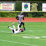Kenyon Jordan (18) breaks away from a Dimond High School defender to score on a 71-year reception in the third quarter at Adair-Kennedy Field on Saturday afternoon. (Mark Sabbatini / Juneau Empire)