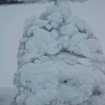 Ice coats a Jet Ranger helicopter that became stranded on the summit of Mount Mageik near the Valley of 10,000 Smokes in early September 2013. Sam Egli, the owner of the helicopter, later flew up with another helicopter and a mechanic who thawed this helicopter. Egli eventually flew this helicopter back to his base in King Salmon. (Photo by Taryn Lopez)