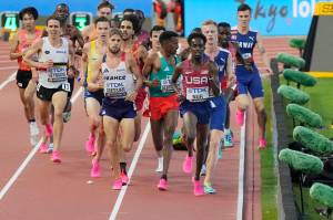 Runners compete in a mens 5,000-meters heat during the World Athletics Championships in Budapest, Hungary, on Thursday. (AP Photo/Martin Meissner)