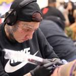 Clarise Larson / Juneau Empire
Orlando tattoo artist Chrystal Nevius gives Juneau resident Jamaica Matthews an Ursula tattoo Thursday afternoon at Elizabeth Peratrovich Hall during the Ink Masters Tattoo Show.