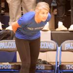 Thunder Mountain High School volleyball coach Julie Herman offers guidance to her team during their three-game home-court match against Juneau-Douglas High School: Yadaa.at Kalé on Friday night. (Mark Sabbatini / Juneau Empire)