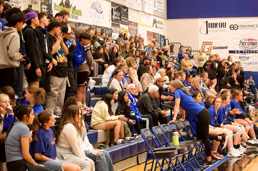 A largely home crowd fills the bleachers at Thunder Mountain High School on Friday night for the volleyball teams three-game matchup against Juneau-Douglas High School: Yadaa.at Kalé. (Mark Sabbatini / Juneau Empire)