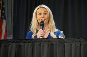 Kelly Tshibaka speaks at the Alaska Federation of Natives convention in October 2022. A group led by the former Republican U.S. Senate candidate has been accused of violating state campaign finance laws. (Photo by Yereth Rosen./Alaska Beacon)