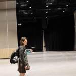 The project manager for the Centennial Hall ballroom renovation, Lisa Eagan-Lagerquist, points out new features of the ballroom set to open its doors again for the first time on Saturday after nearly nine months under construction. (Clarise Larson / Juneau Empire)