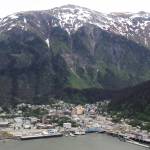 Mountains tower over downtown Juneau in late May. (Clarise Larson / Juneau Empire File)