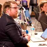 Mark Sabbatini / Juneau Empire
James Brooks, a reporter for the Alaska Beacon, moderates a debate Thursday night at the KTOO studios about public safety by 13 candidates seeking four open seats on the City and Borough of Juneau Assembly.