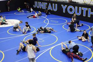 Clarise Larson / Juneau Empire
Athletes practice new moves while wrestling during a Labor Day weekend clinic at the Juneau Youth Wrestling Clubs new building on Monday.
