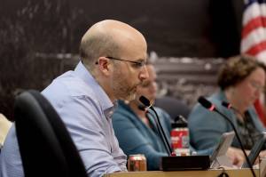 Deputy City Manager Robert Barr shares an update with the Assembly Monday evening following Resurrection Lutheran Churchs decision to not host the citys cold weather emergency shelter this year. (Clarise Larson / Juneau Empire)