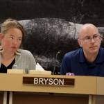 City and Borough of Juneau Assembly members Alicia Hughes-Skandijs and Wade Bryson listen to public testimony Monday night about whether the city should adopt new maps that show updated landslide and avalanche risk downtown. (Clarise Larson / Juneau Empire)