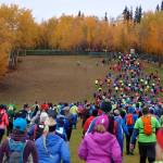 Runners ascend the old ski hill on the campus of the University of Alaska Fairbanks at the start of the 2015 Equinox Marathon. (Photo by Ned Rozell)