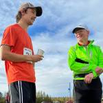 Zack Bursell, left, stands with father John, right, after winning the Equinox Marathon in Fairbanks, Saturday, Sept. 16. (Photo courtesy Jamie Bursell)
