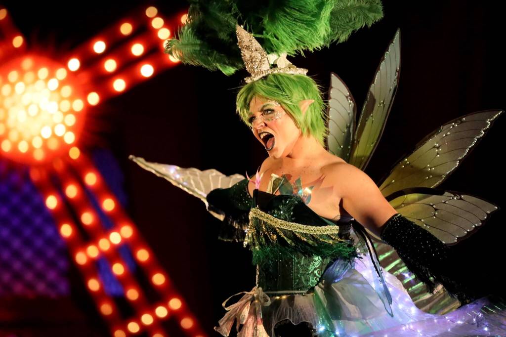 Roman Wilde puts on a magical performance during the eighth annual GLITZ drag show at the Centennial Hall ballroom Saturday night. (Clarise Larson / Juneau Empire)