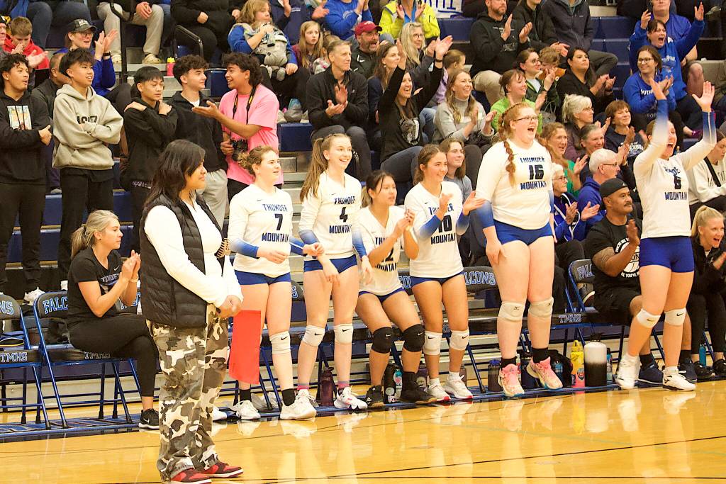 Thunder Mountain High School players and fans celebrate winning a set at home against Juneau-Douglas High School: Yadaa.at Kalé last Saturday. (Mark Sabbatini / Juneau Empire)