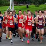 High school runners start the Sitka Invitational Boys 5K race on Saturday. The field included 150 runners in the boys field and 91 in the girls. (James Poulson / Sitka Sentinel)