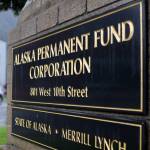 Cars drive past the Alaska Permanent Fund Corp. building in Juneau on Thursday. This years Permanent Fund dividend will be $1,312, the state Department of Revenue announced. (Clarise Larson / Juneau Empire)