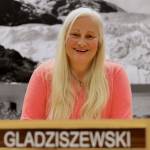 Soon-departing Assembly member and Deputy Mayor Maria Gladziszewski smiles for a photo at her seat in the Assembly chambers Thursday afternoon. (Clarise Larson / Juneau Empire)