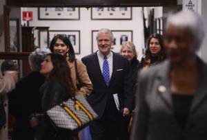 U.S. Sen. Dan Sullivan, R-Alaska, walks down a hallway Tuesday, Feb. 7, 2023, at the Alaska State Capitol. (James Brooks/Alaska Beacon)