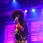 AirJazz, a Tlingit hip-hop artist from Juneau, raps to the crowd during a performance Thursday night as part of the Áakw Rock music festival at Centennial Hall. (Clarise Larson / Juneau Empire)